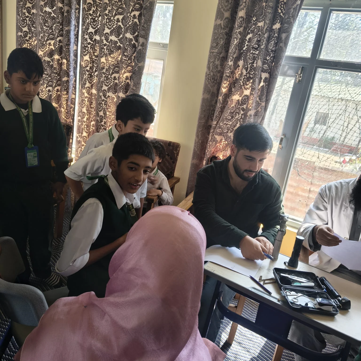 The screening team working with students at Abhedananda Home