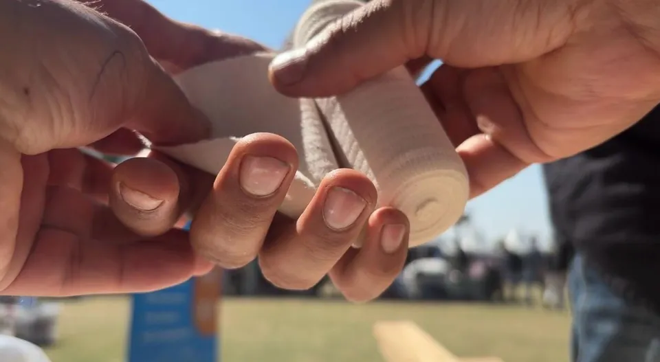 A close-up of bandaging at the RehabNation first-aid post at EMERGE, SKICC