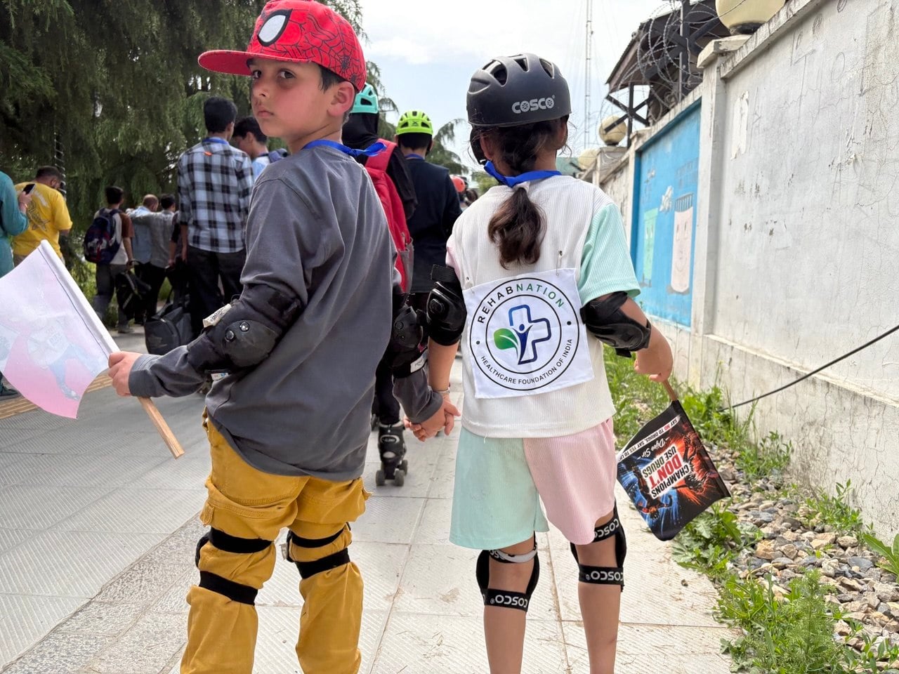 Children taking part in the RehabNation anti-drug skating rally in Kashmir